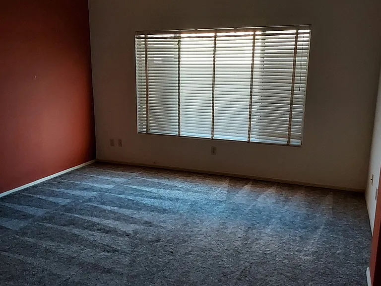Master bedroom wall is now navy but can paint, split entry