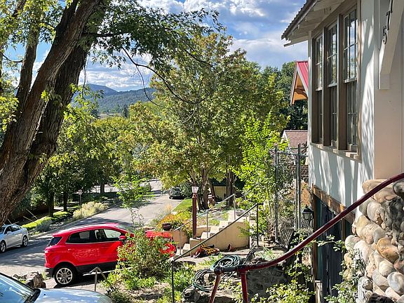 Across the front from upper yard looking W into Durango and beyond.