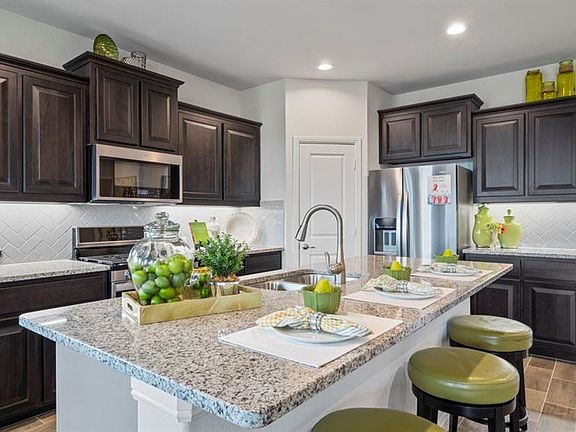 Photos shown here may not depict the specified home & features included are for illustration purposes only