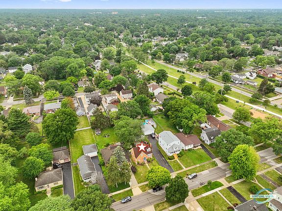 just a few houses from the Prairie Path and park.