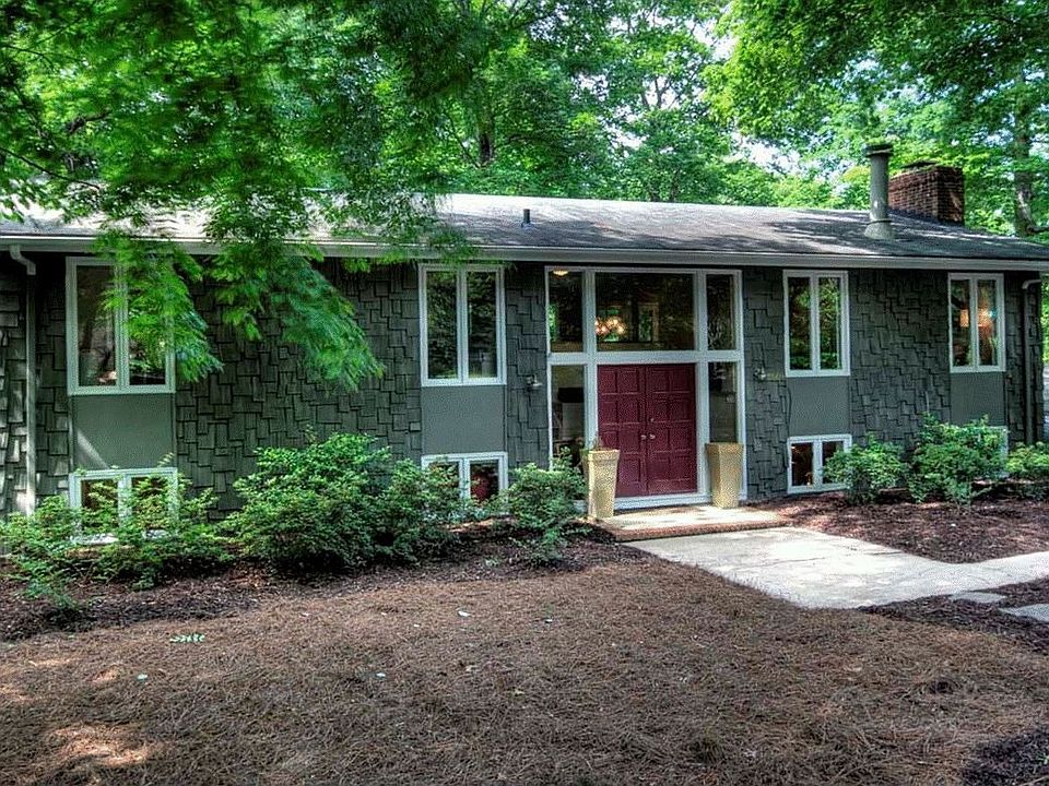 Front of house - painted ceder shingles and tons of windows