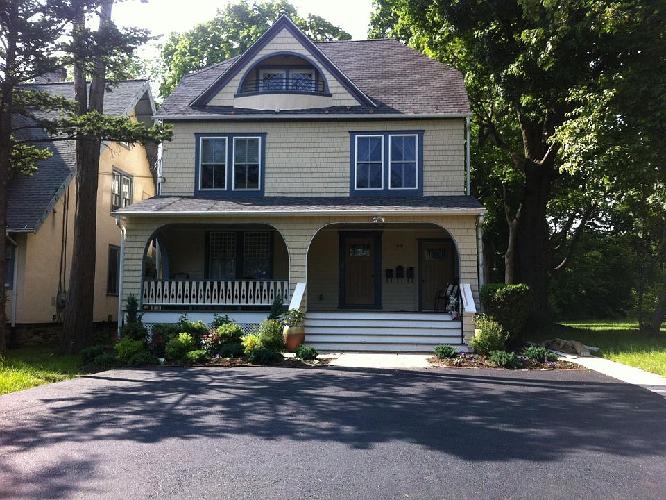 Front of home, note 3rd floor balcony. Off street parking and shared front porch