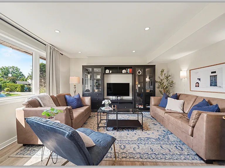 Beautiful sun-drenched living room for midterm living in Ottawa.