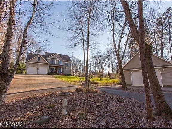 Home with attached 2 car garage is available. Shop is not for rent with any lease.