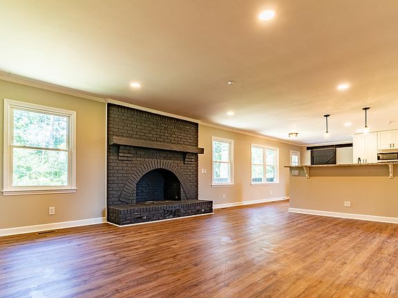 Living space with large fireplace.
