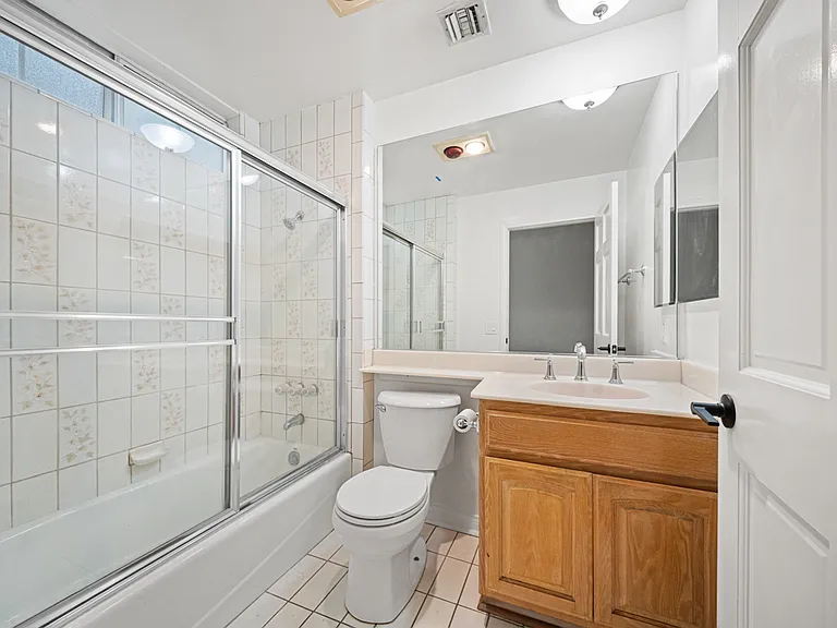 Main Floor Bedroom #4 with Ensuite Bathroom