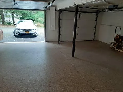 two-car garage with two remote control garage openers.