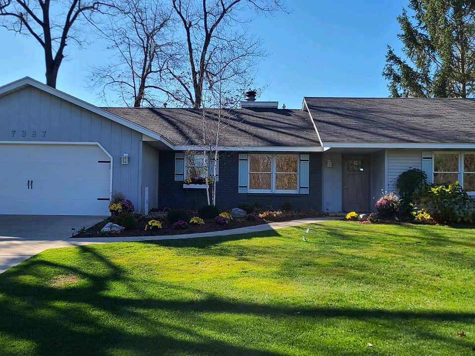 7327 Davies Drive. House, 2 Stall Garage, new landscaping