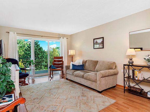 Living Room with large windows and balcony
