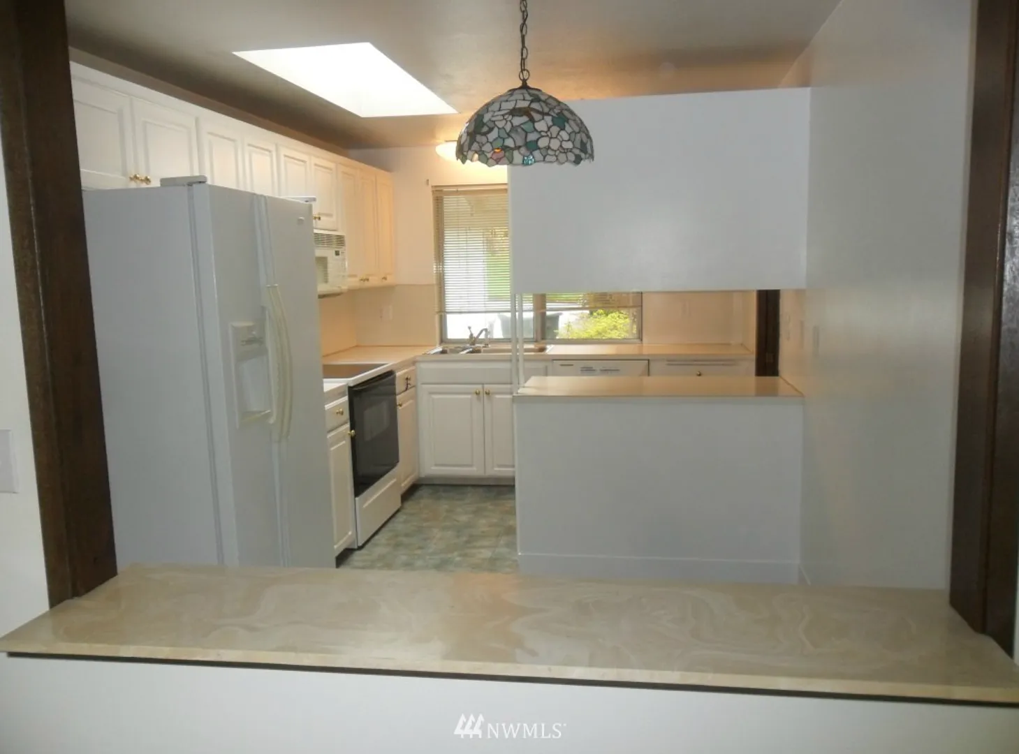 Spacious 4-Bed Tri-Level with 4-Car Garage Walk to Elementary, Middle & High School — Photo 3
