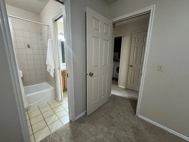 View from master to bathroom and hall laundry room