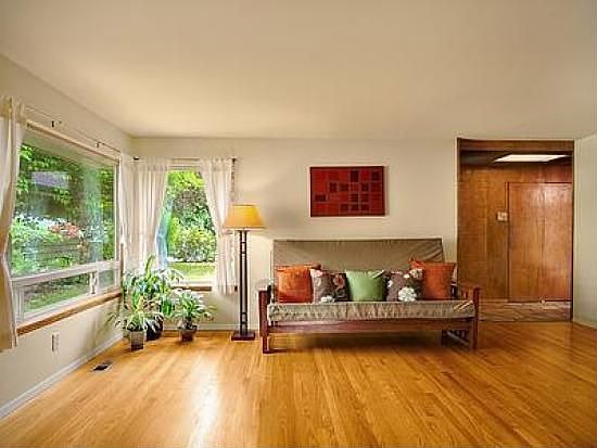 Bright, spacious living room with hardwood floor