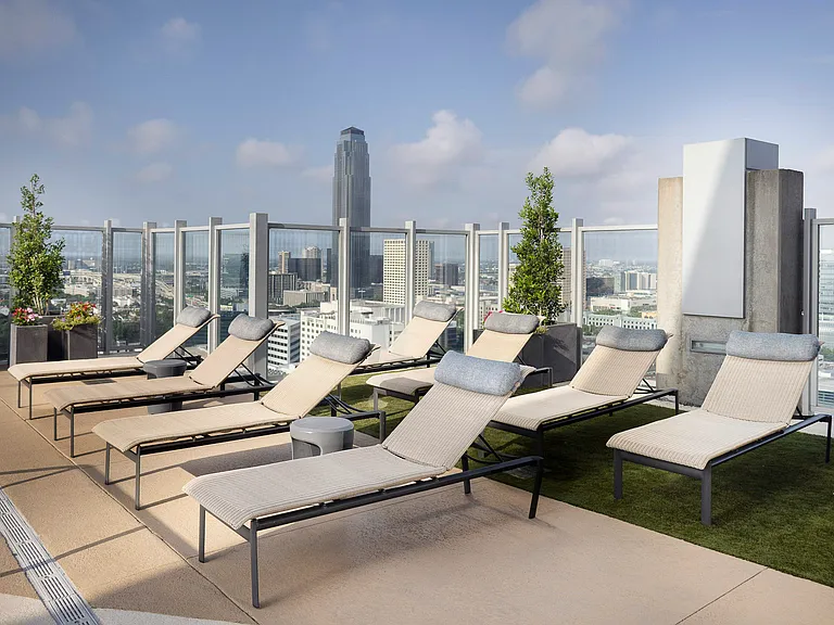 Pool deck lounge seating, BBQ grills and dining areas available