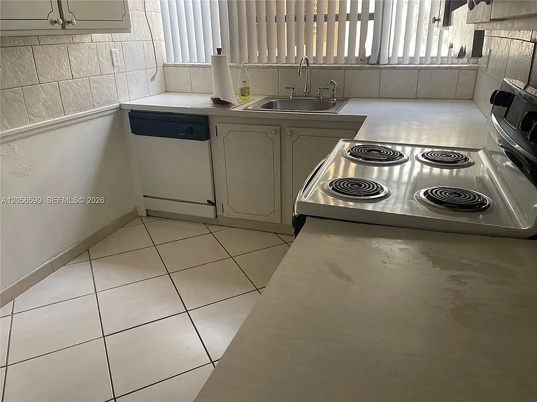 940 NE 199th St #209 — Photo 4