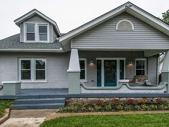 Front. Covered Porch & Swing