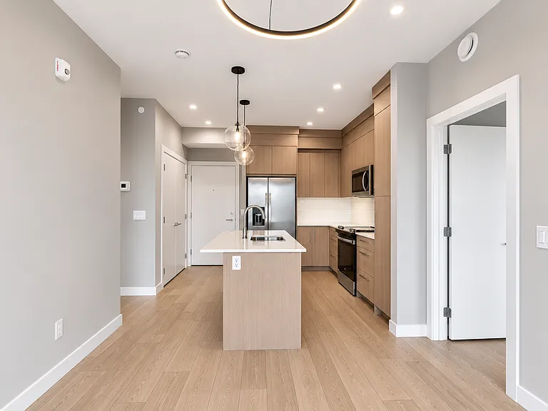 265 Wolf Willow Blvd SE #2415/2413 — Photo 2