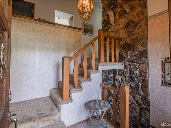 The front door and entry.  Local stone was used for the fireplace you can see to the right.