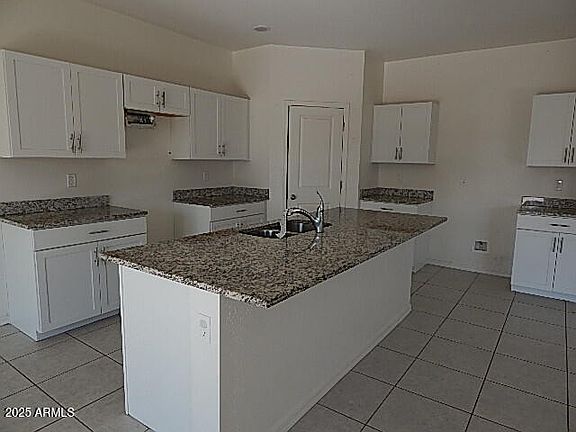 3rd image of 9517 W ILLINI Street
