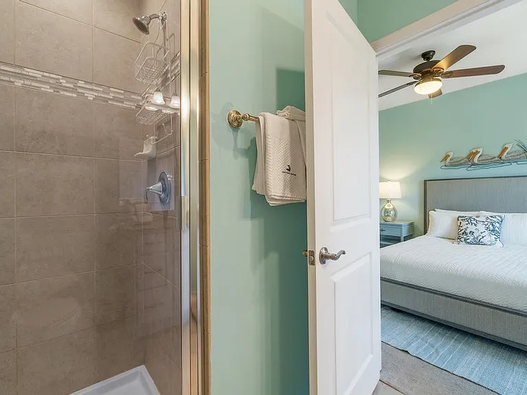 Upstairs bedroom with full size bed and en-suite bathroom - stand up shower only.