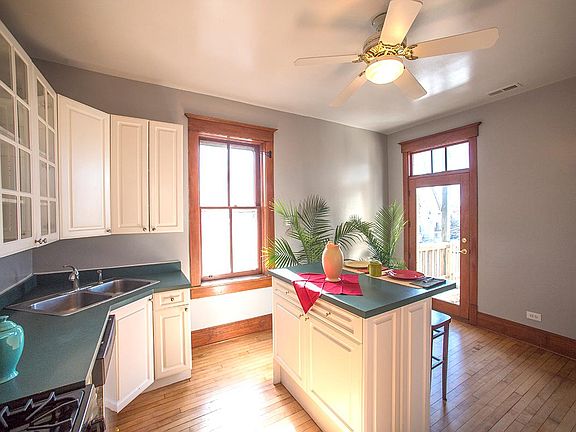 French door opens onto back porch