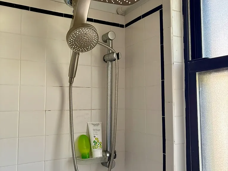 August 2026: Upgraded dual rain/hand-held shower head.