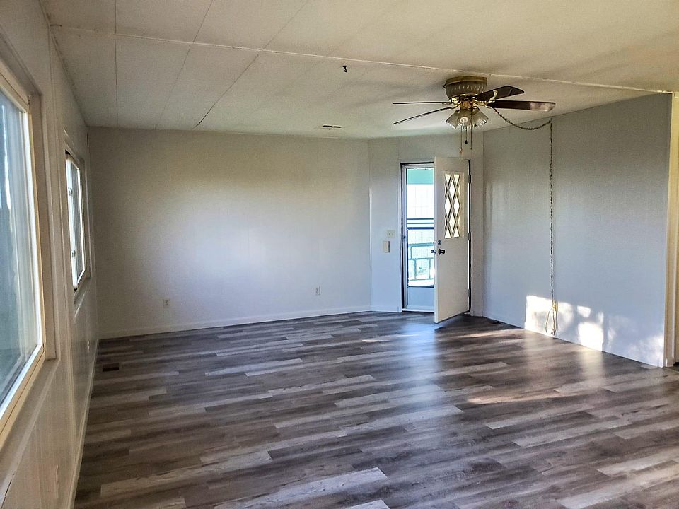 Spacious living room with door to deck