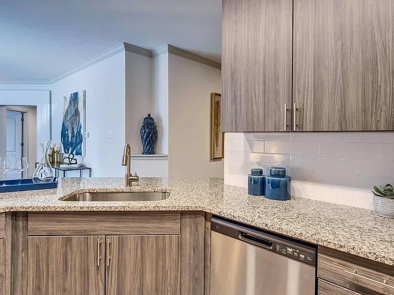 Kitchens feature granite countertops and 42" cabinets