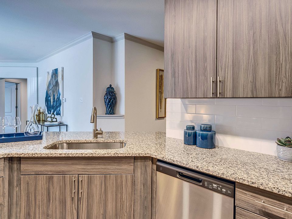 Kitchens feature granite countertops and 42" cabinets