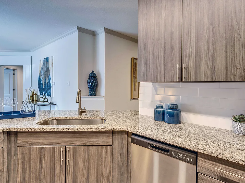 Kitchens feature granite countertops and 42" cabinets