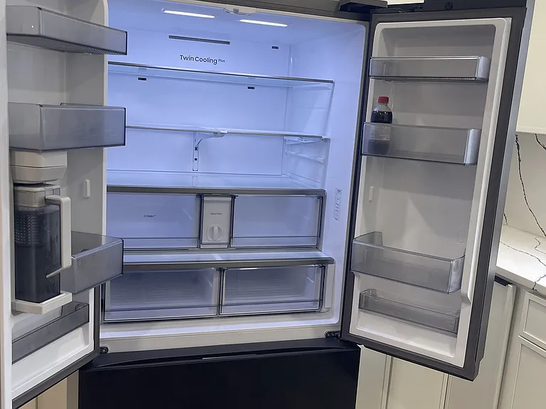 New wide double door fridge with water and ice maker included.