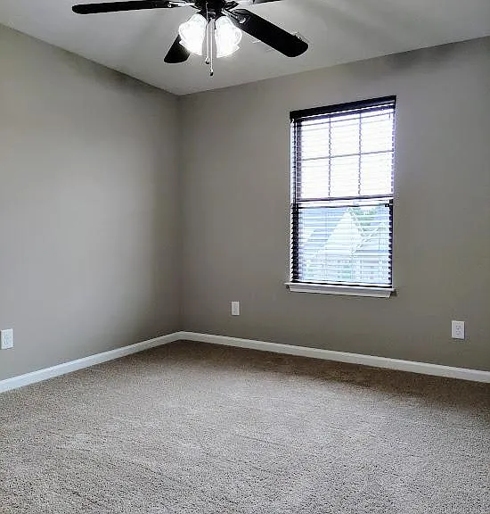 One of the secondary bedrooms located on the second floor.