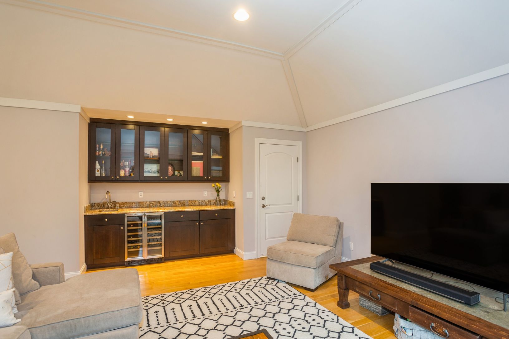 Den with wet bar features