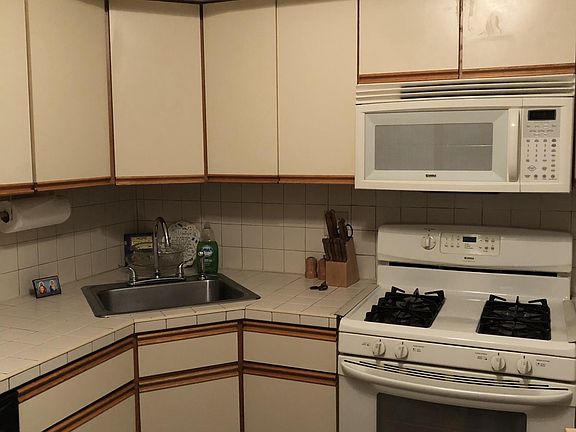 Kitchen with ceiling lights on