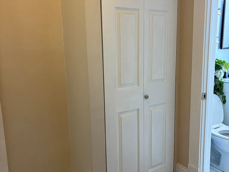 Linen closet outside primary bathroom