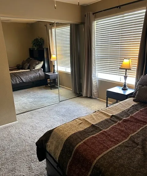 2nd bedroom room darkening drapes and large closet