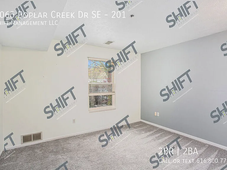 3065 Poplar Creek Dr SE #201 — Photo 14