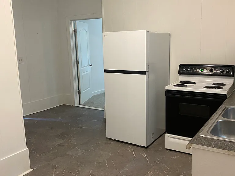 Brand new flooring installed. Eat in kitchen.
