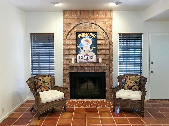 Custom details in the fireplace and the tile floor.