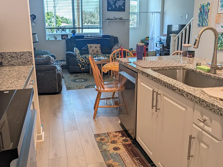 View of family room and kitchen
