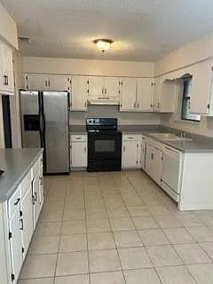 4 bed, 2.0 bath, 1242 sqft, $1,495 — Photo 2