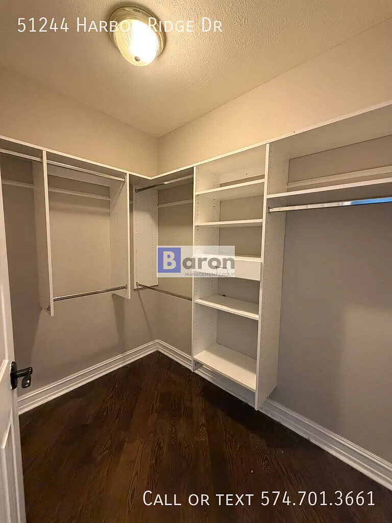 "Luxury Living Awaits: Spacious 4-Bedroom Home. Gleaming Hardwood Floors in Granger, IN!" — Photo 3