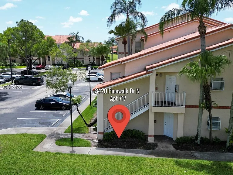 3420 Pinewalk Dr N #717 — Photo 1