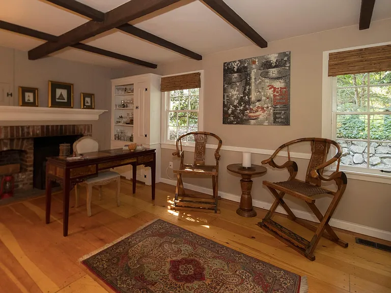 Family room with working fireplace.