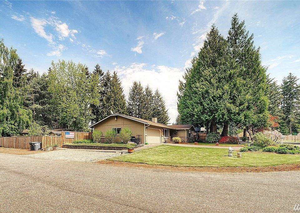 Yearning for space?...look no further. This rambler on a huge 1/3 acre corner lot features a sprawling fully fenced backyard and extra off street parking. 