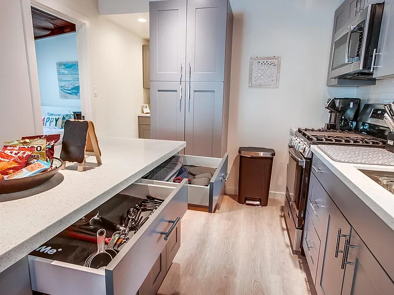 Fully supplied kitchen with all the needs for an in-home cooking experience.