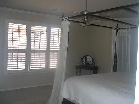 Light and airy master. Room for a sitting area.