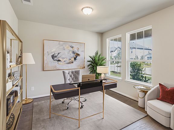Flex room perfect for a study nestled in the front of the home