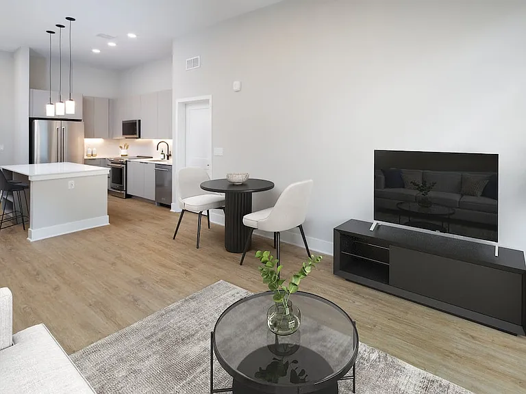 Signature Collection kitchen, dining, and living area