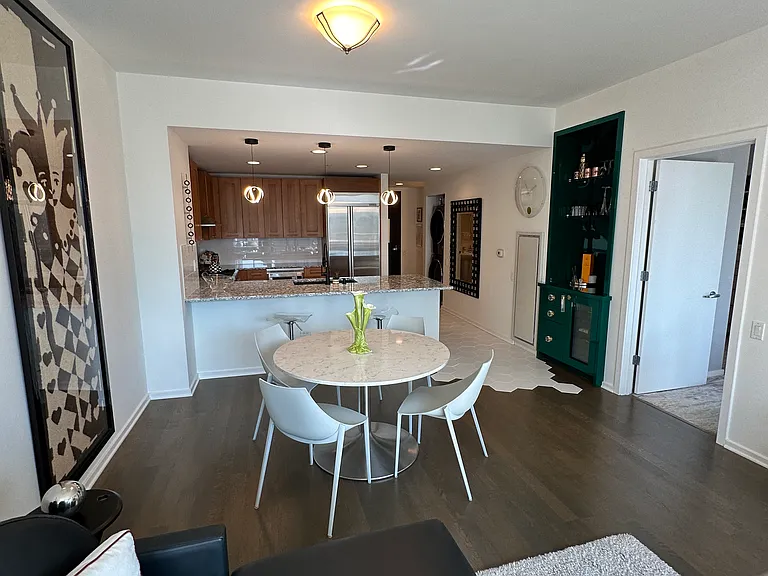 Kitchen and dining room view from living area