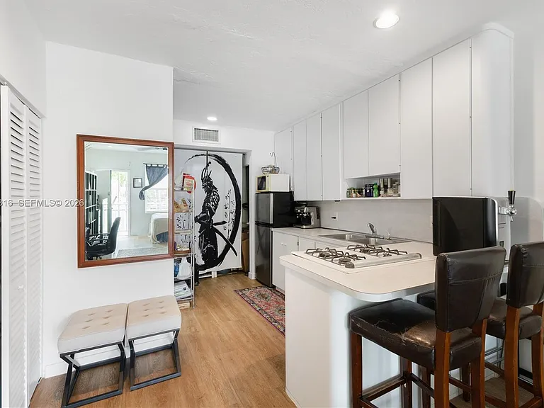 2445 Lake Pancoast Dr #J — Photo 4